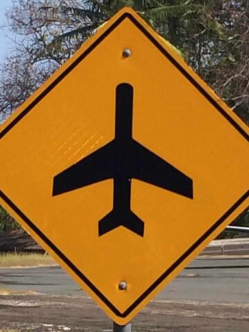 winter travel guide plane sign