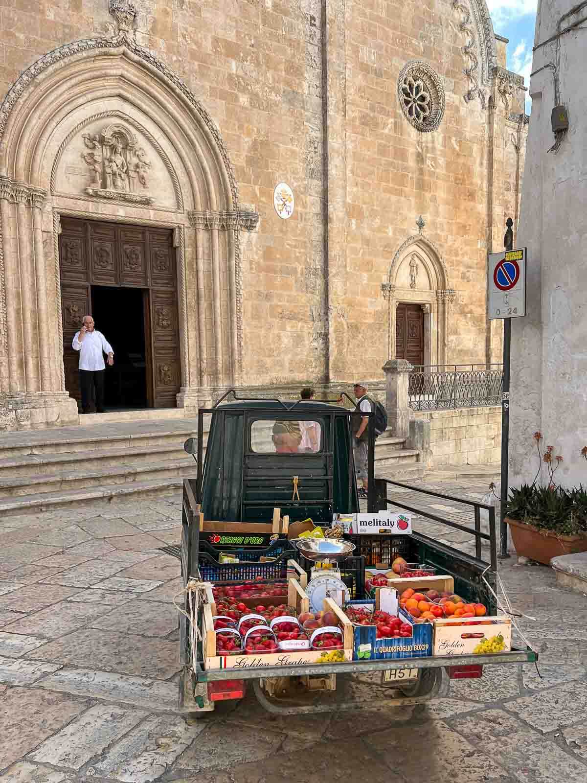 car with produce in Ostuni market