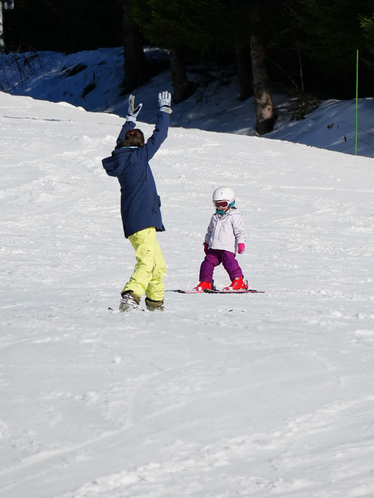 woman and kid snowboarding in Chamonix.