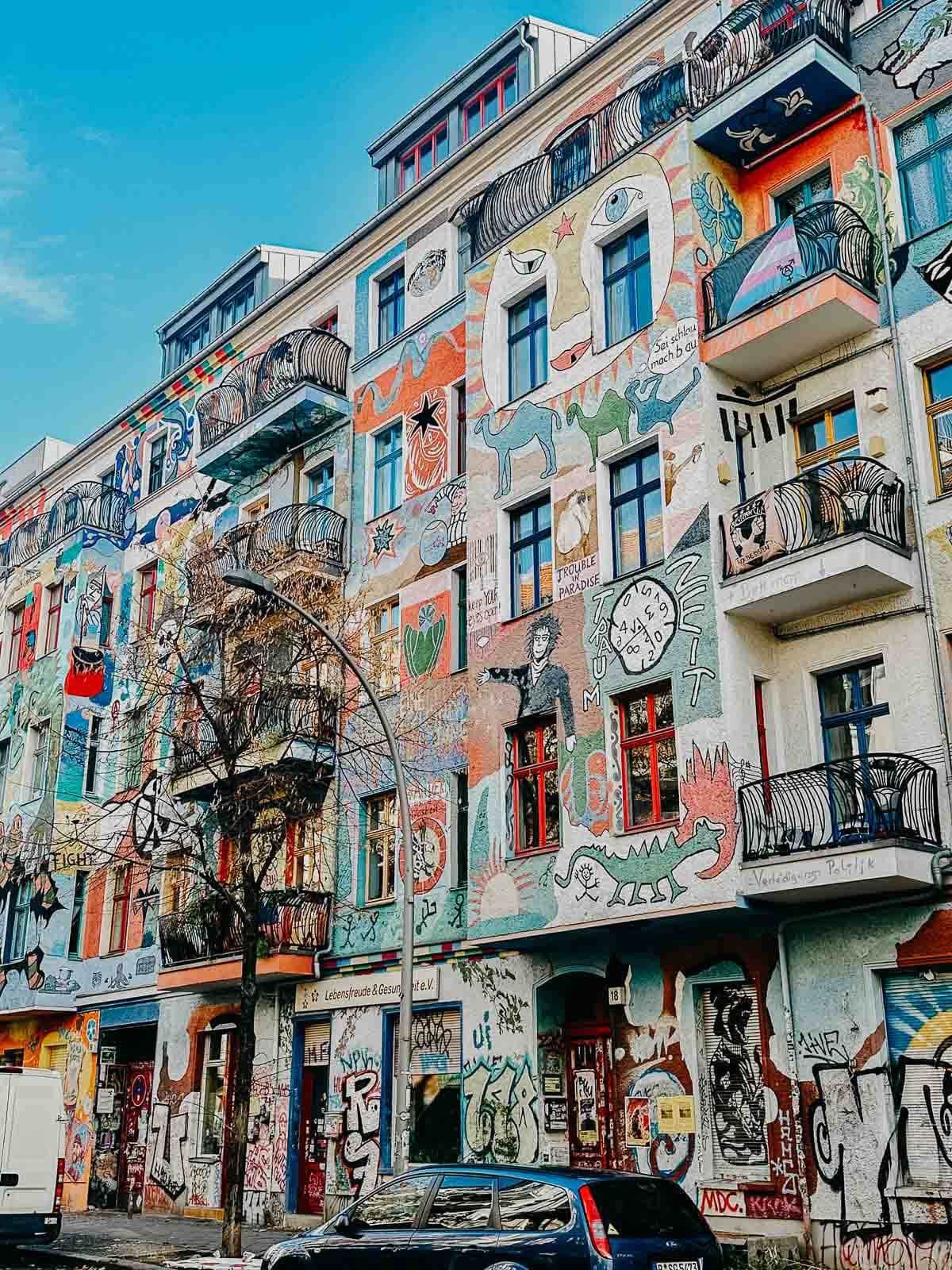 A colorful painted building in the Friedrischhein neighborhood in Berlin.