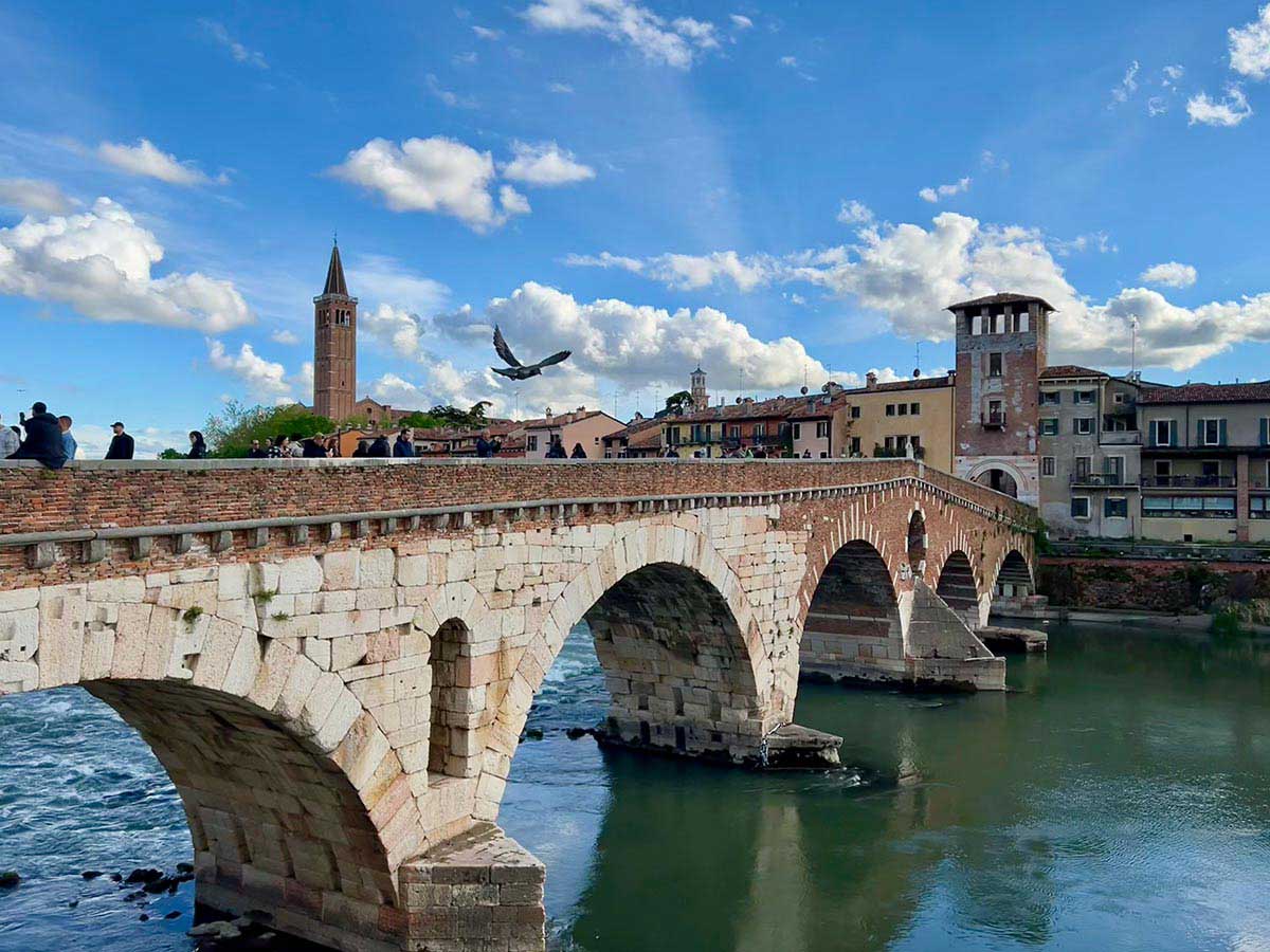 Ponte Pietra and the Adige River.