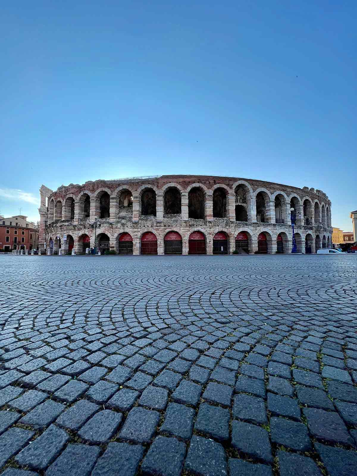 Verona Arena exterior at sunrise.
