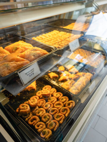 Traditional Greek pastries on display at a bakery in Mykonos.