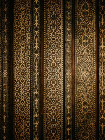 Red and white horseshoe arches inside the Mezquita-Catedral of Córdoba.